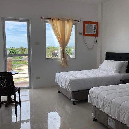 Arriyus Apartelle Daanbantayan Exterior photo
