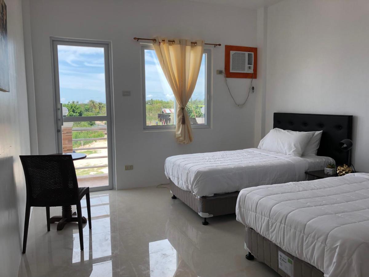 Arriyus Apartelle Daanbantayan Exterior photo